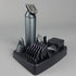 Hair trimmer set with attachments on a gray background