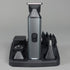Hair trimmer with attachments on a gray background