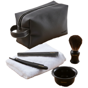 Set of grooming tools including a black leather pouch, comb, brush, towel, and bowl on a transparent background.