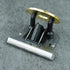 Hair trimmer head with magnetic base on a gray background