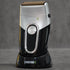 Electric shaver with 'Transform-U' branding on a gray background